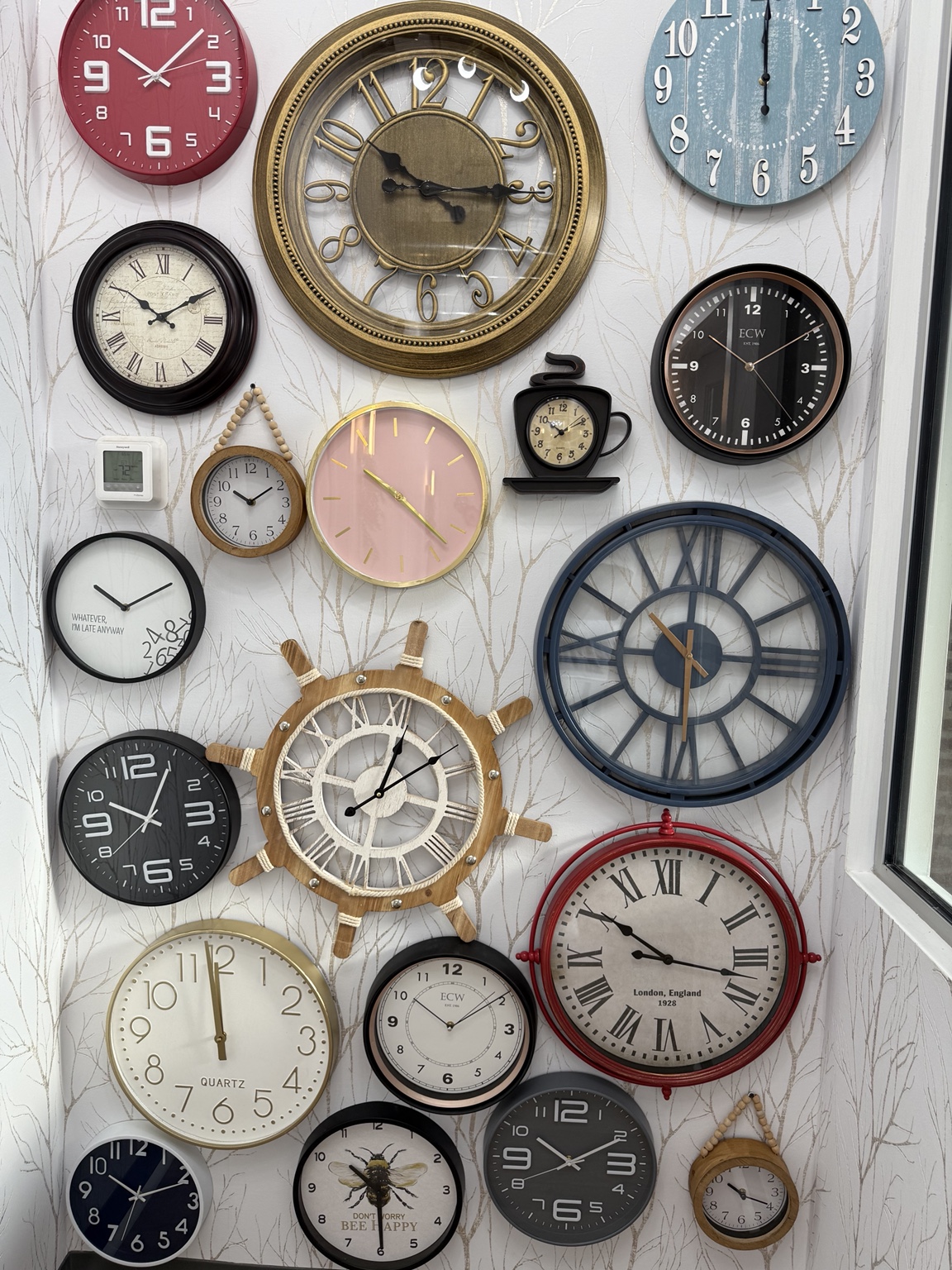 Collection of colorful clocks on the South Loop feature wall